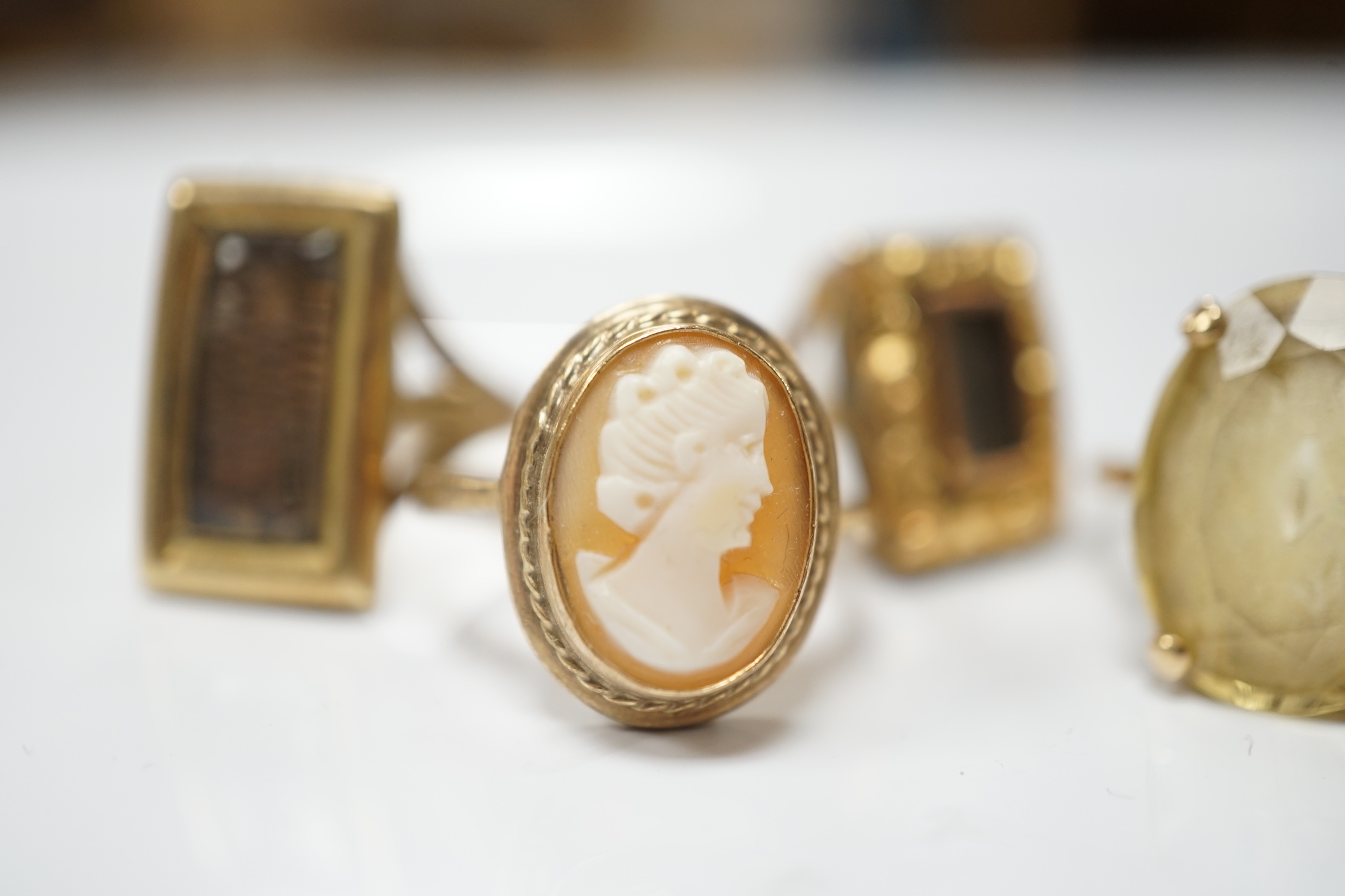 Two 19th century yellow metal mourning brooches, now with shanks converted to dress rings and two other 9ct rings.